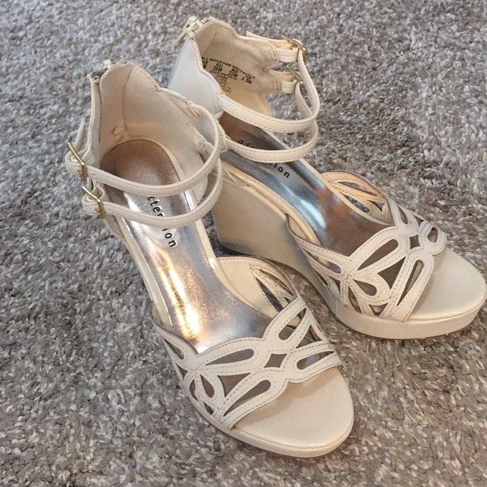 Wedged beige dress shoes